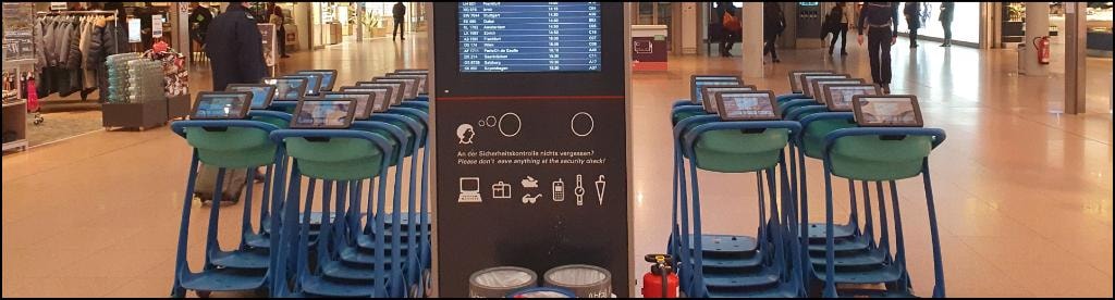Airport baggage trolley with integrated AI-TS tablet interface